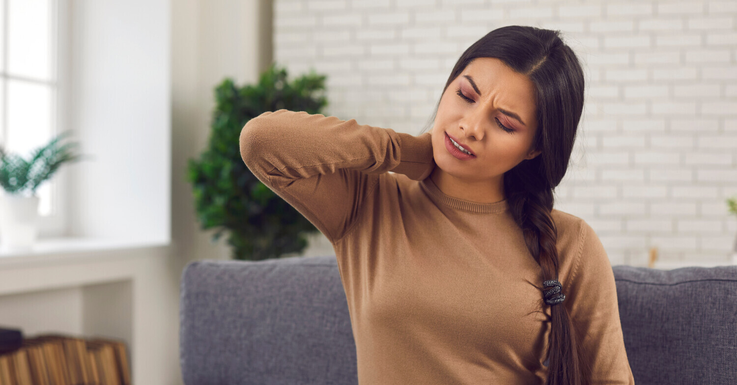 Woman with neck pain after car accident