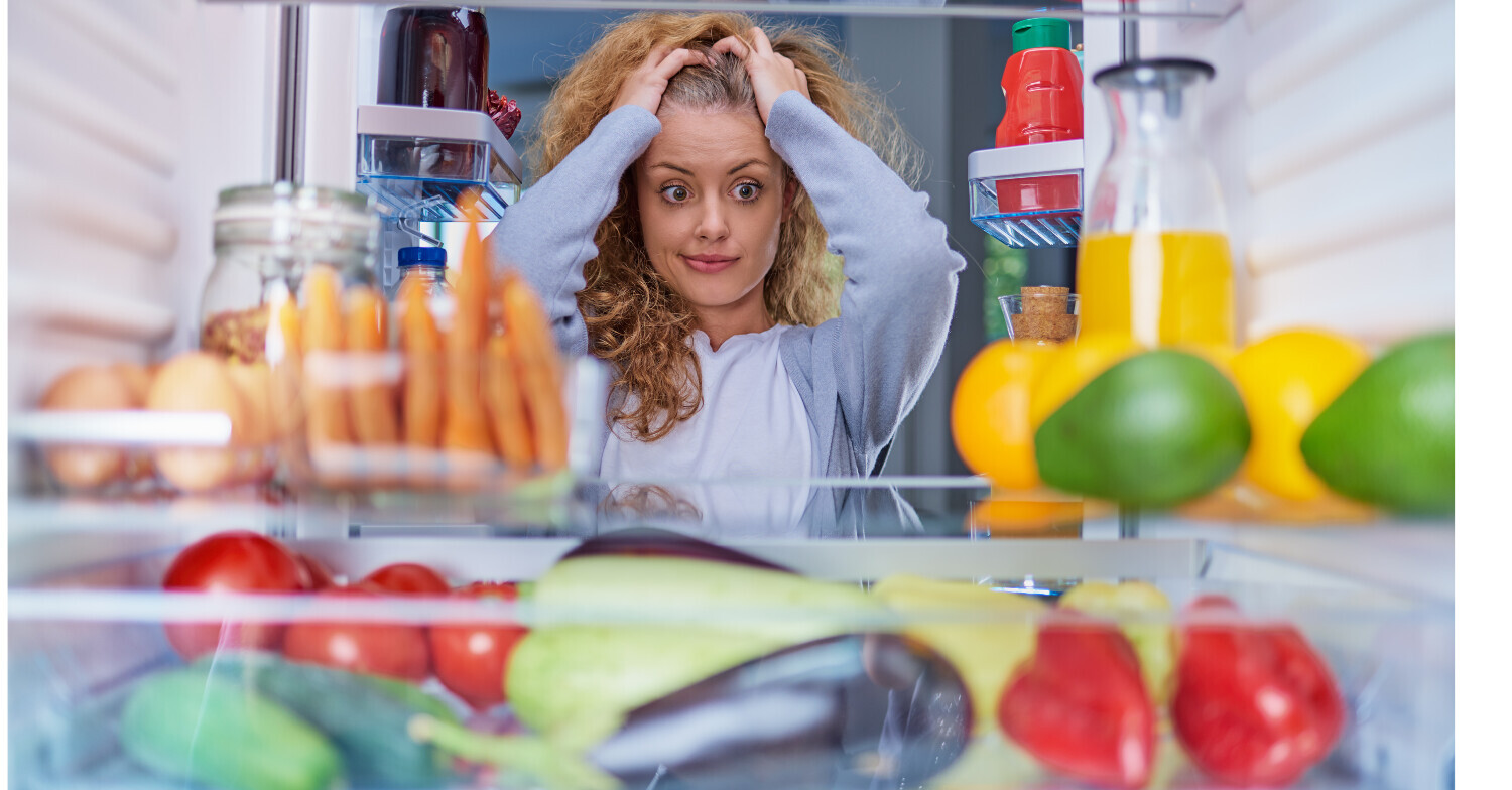 Woman confused by what to make for dinner