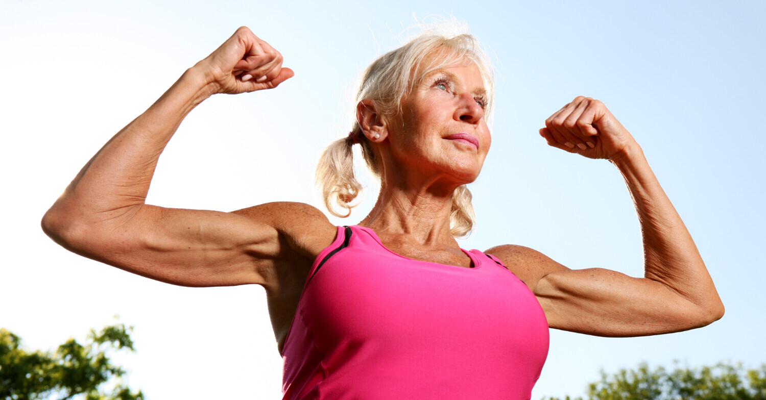Woman showing her arm muscles